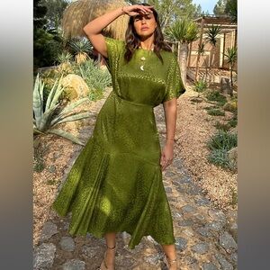 Gorgeous silky dress from Never Fully Dressed. Brand New with tags.